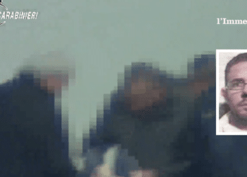 Donato Delli Carri; sullo sfondo, il video dell'operazione dei carabinieri del 2020
