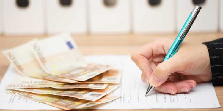 woman is signing contract to get a lot of money