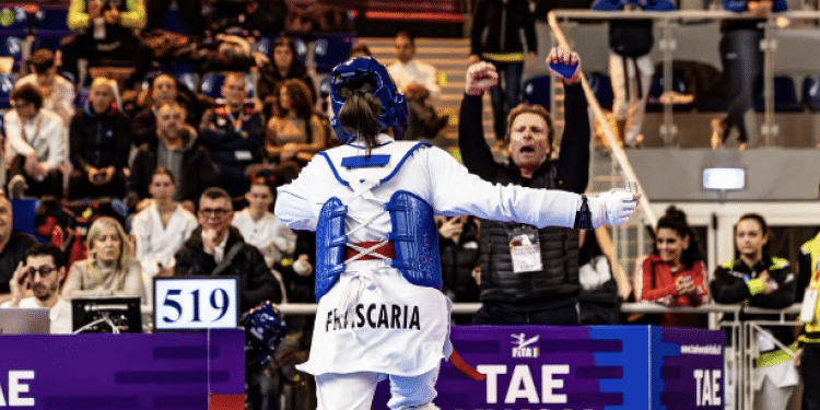 l'esultanza del Maestro Ugo Smiraglia e della sua atleta Frascaria